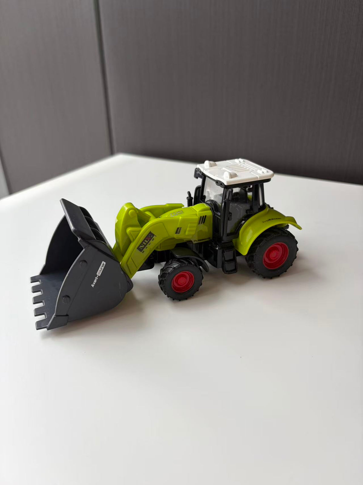 Green Compact Front Loader Model with Black Utility Bucket