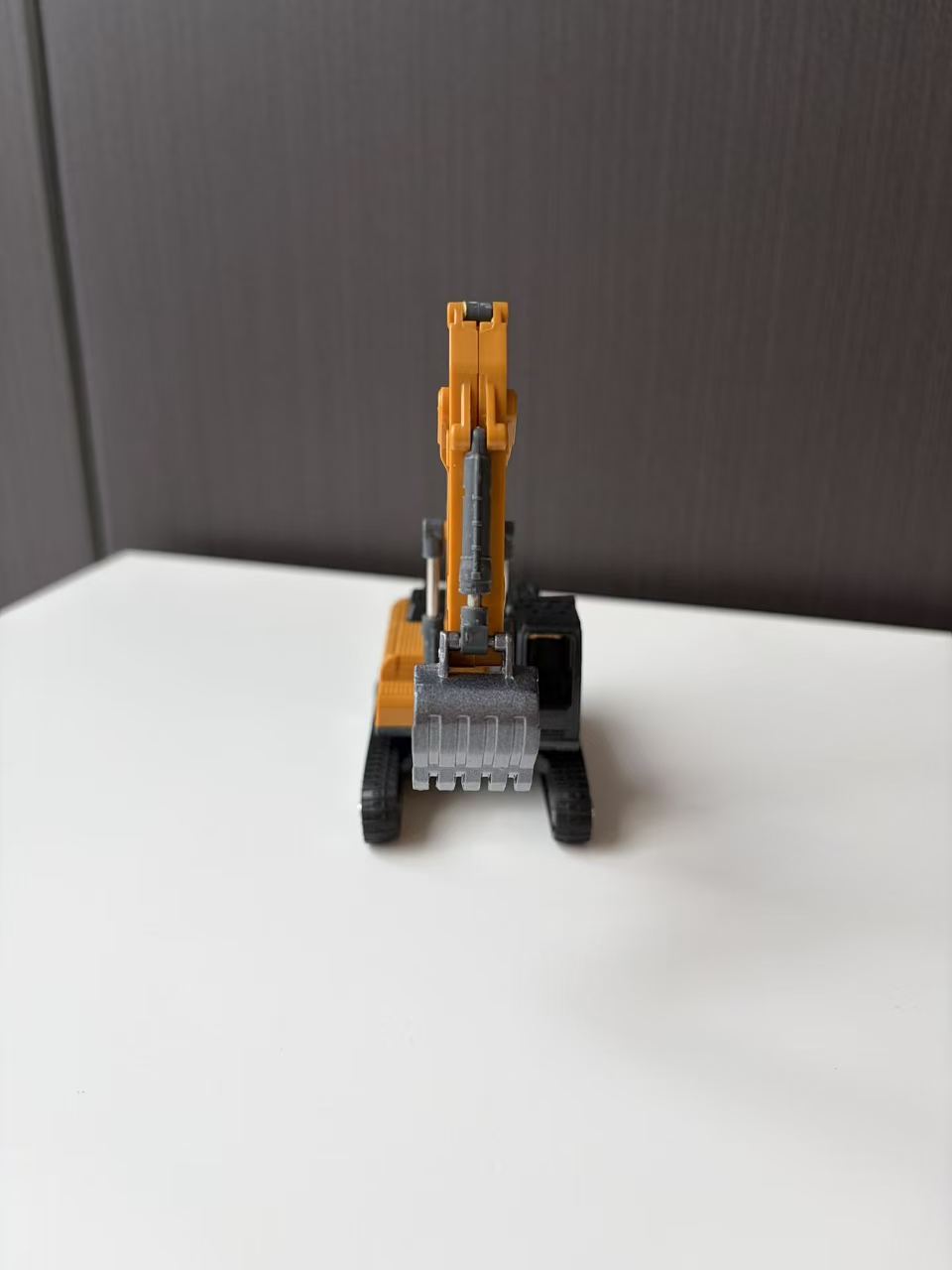 Orange Tracked Excavator Model with Long Boom and Digging Bucket