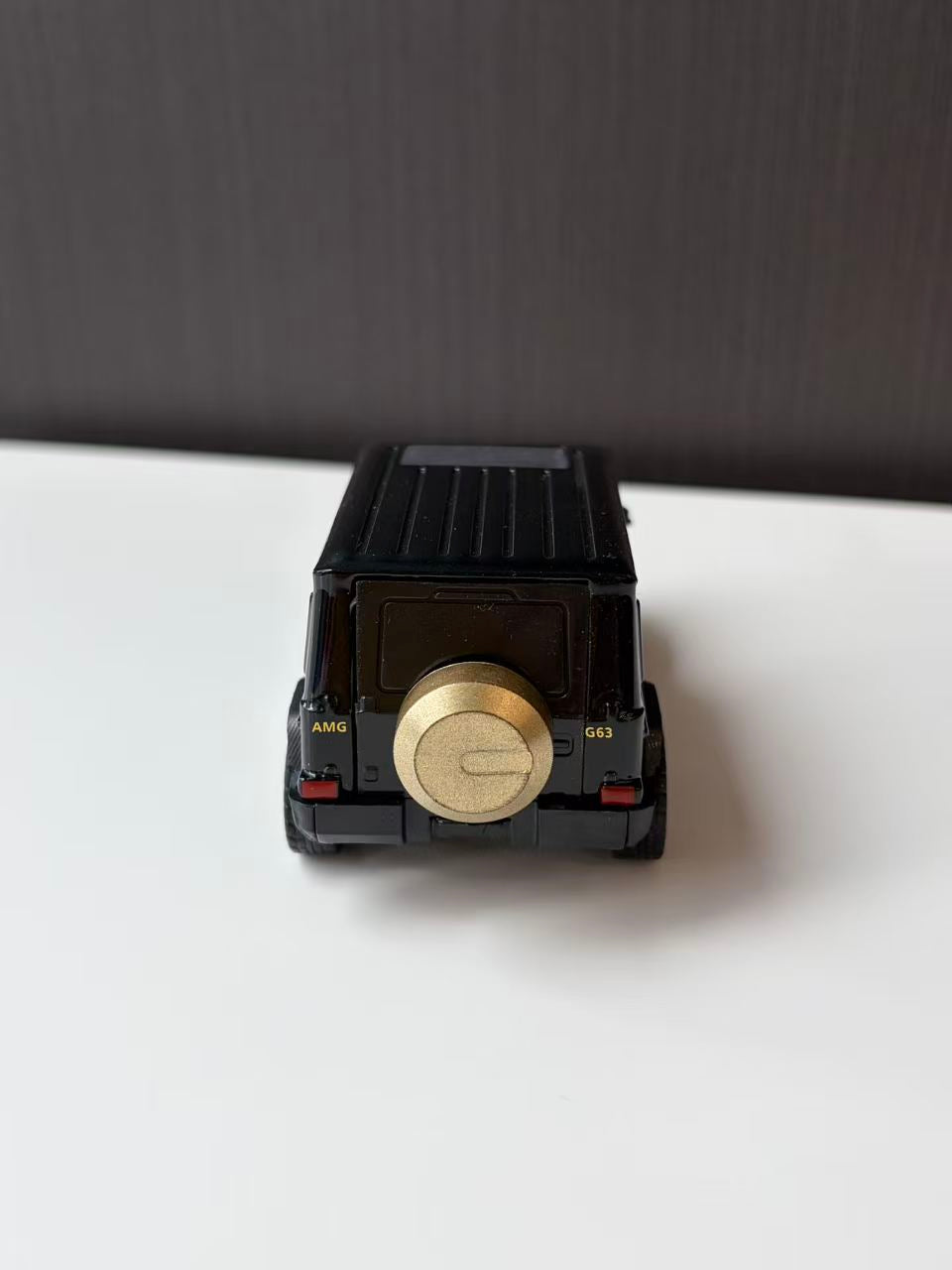 Black Off-Road SUV Model with Roof Rack and Spare Wheel
