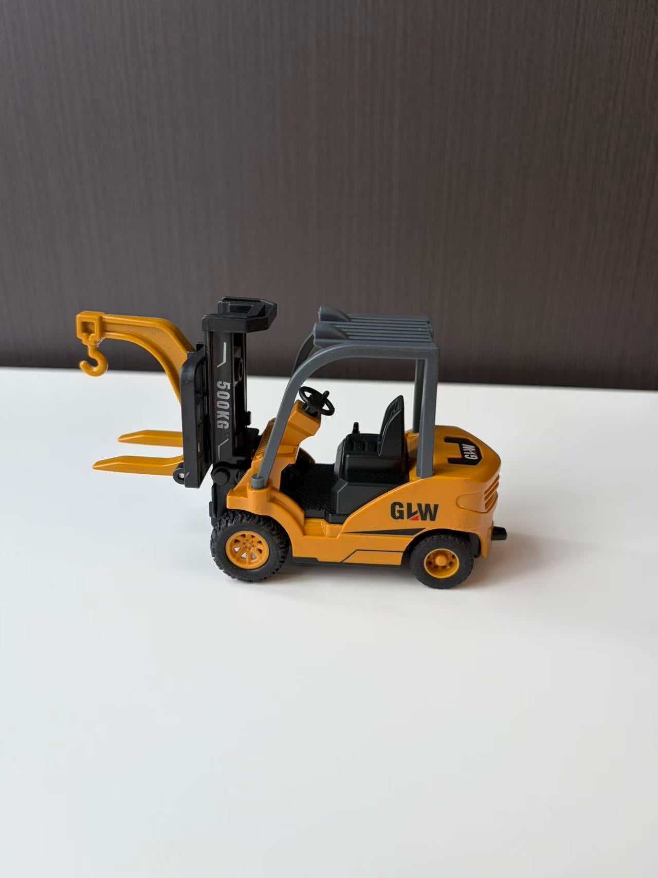 Yellow Industrial Forklift Model with Raised Mast and Forks