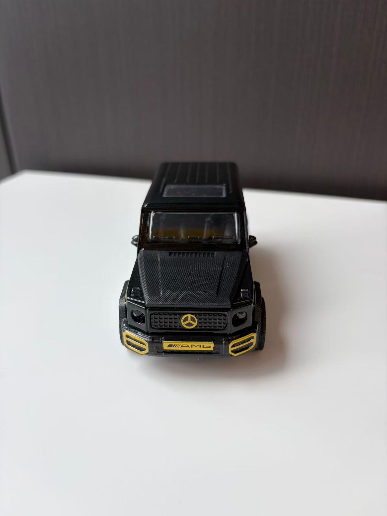 Black Off-Road SUV Model with Roof Rack and Spare Wheel