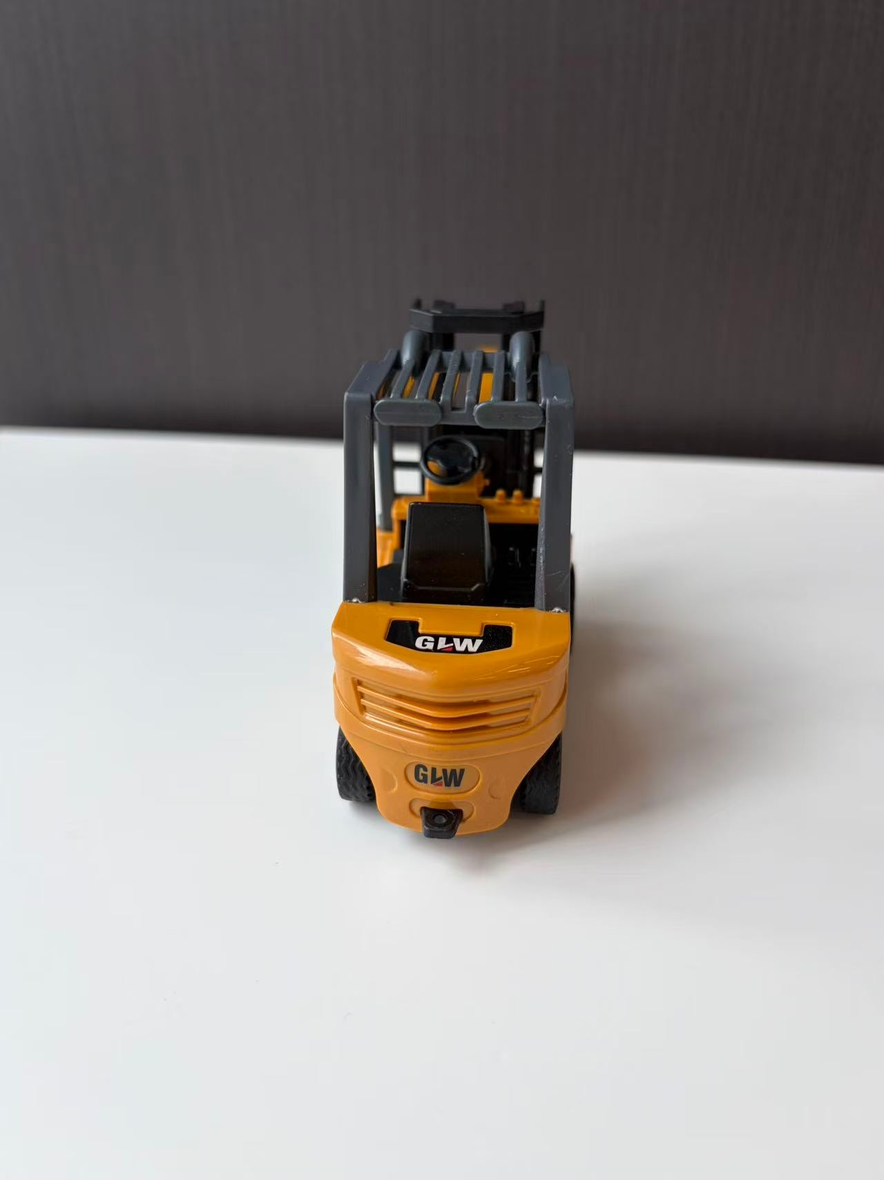Yellow Industrial Forklift Model with Raised Mast and Forks
