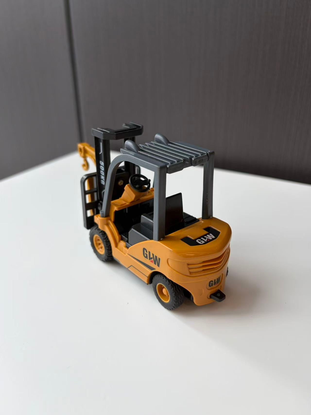 Yellow Industrial Forklift Model with Raised Mast and Forks