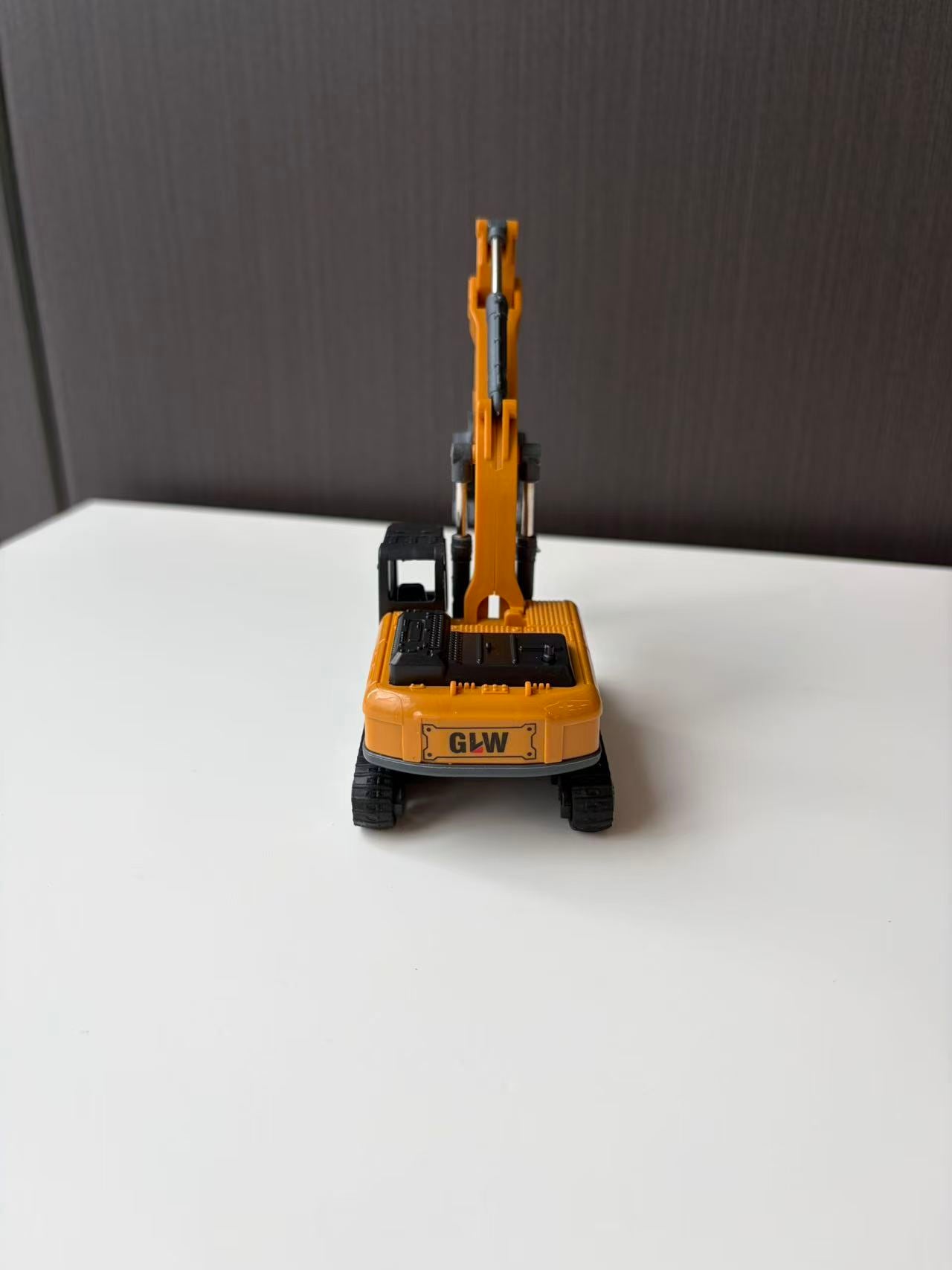 Orange Tracked Excavator Model with Long Boom and Digging Bucket
