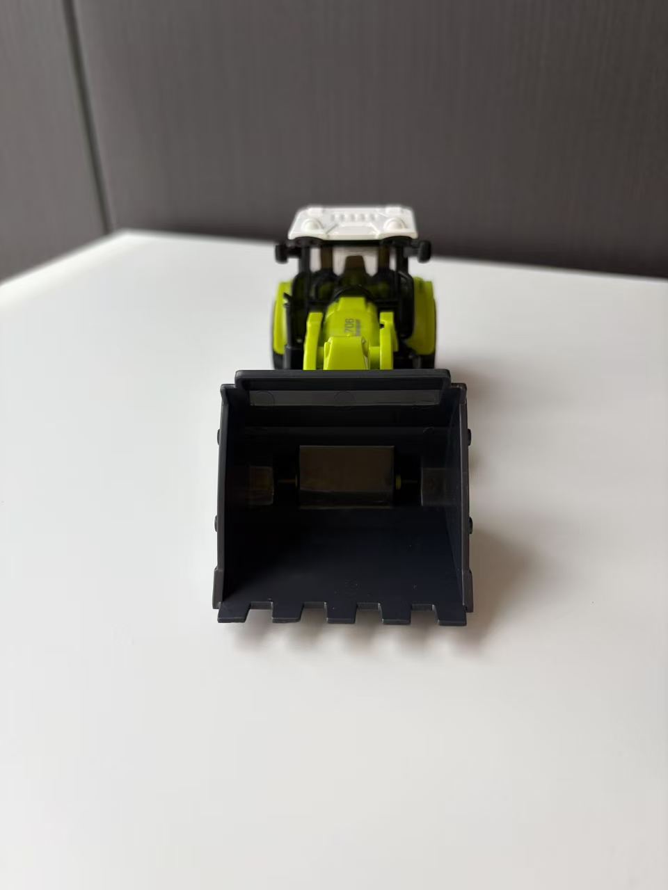 Green Compact Front Loader Model with Black Utility Bucket