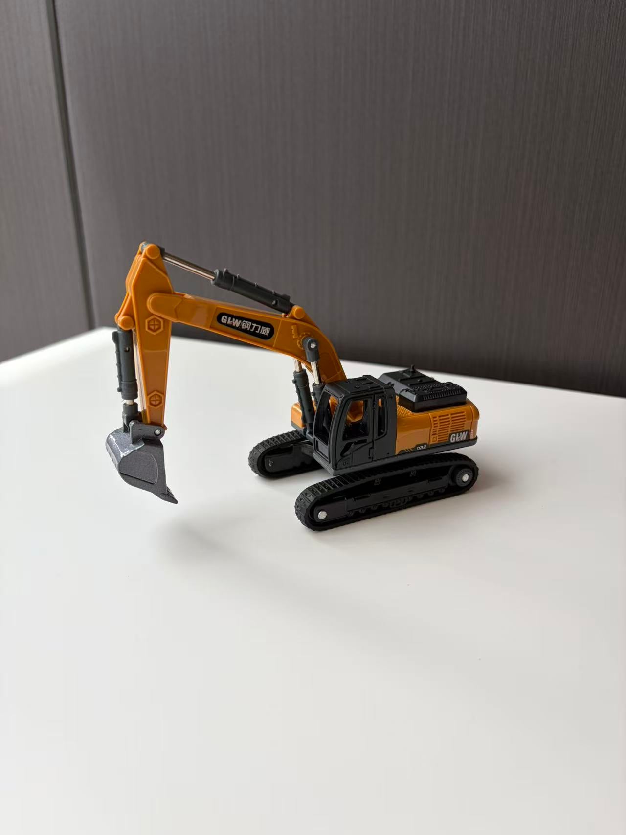 Orange Tracked Excavator Model with Long Boom and Digging Bucket